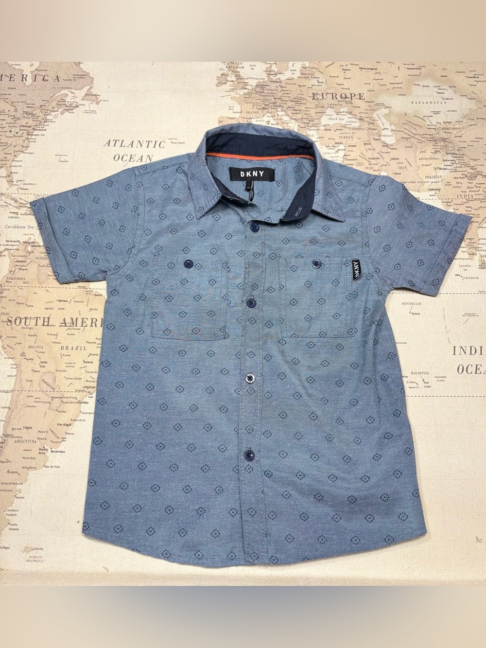 DKNY Boys' Light Blue Short Sleeve Button-Down Shirt with Subtle Navy Motif